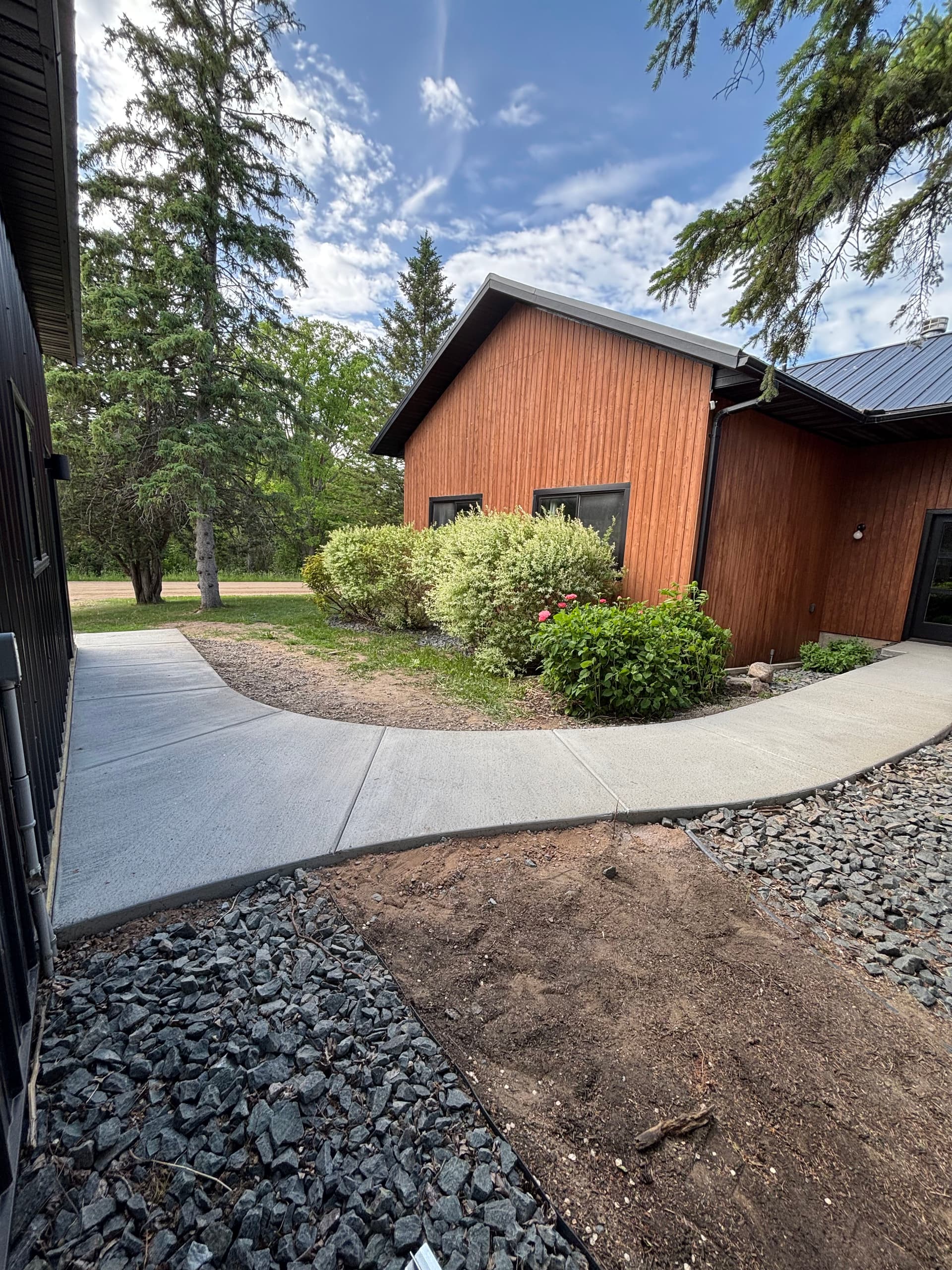 Gallery photos for New Concrete Sidewalk Installation Wraps a Full Property: Image #1