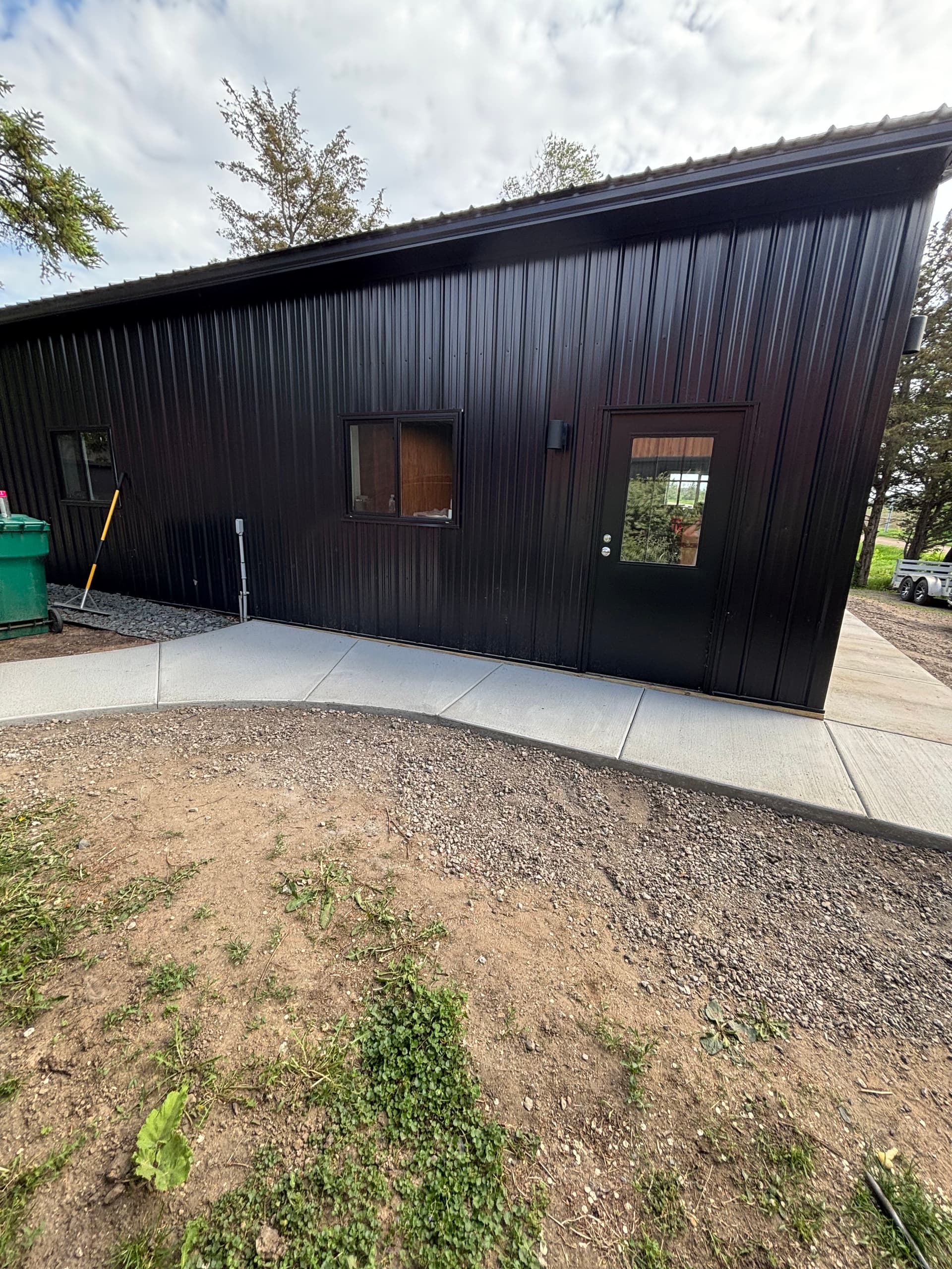 Gallery photos for New Concrete Sidewalk Installation Wraps a Full Property: Image #2