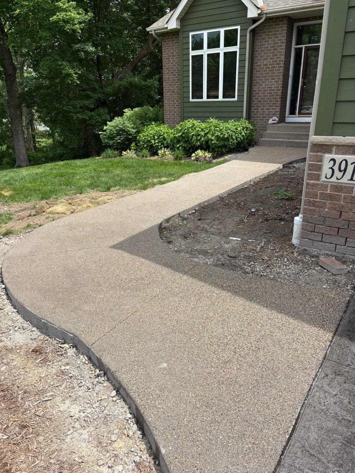 Gallery photos for Slate Gray Roman Slate Stamped Concrete Driveway with Black Accent: Image #4