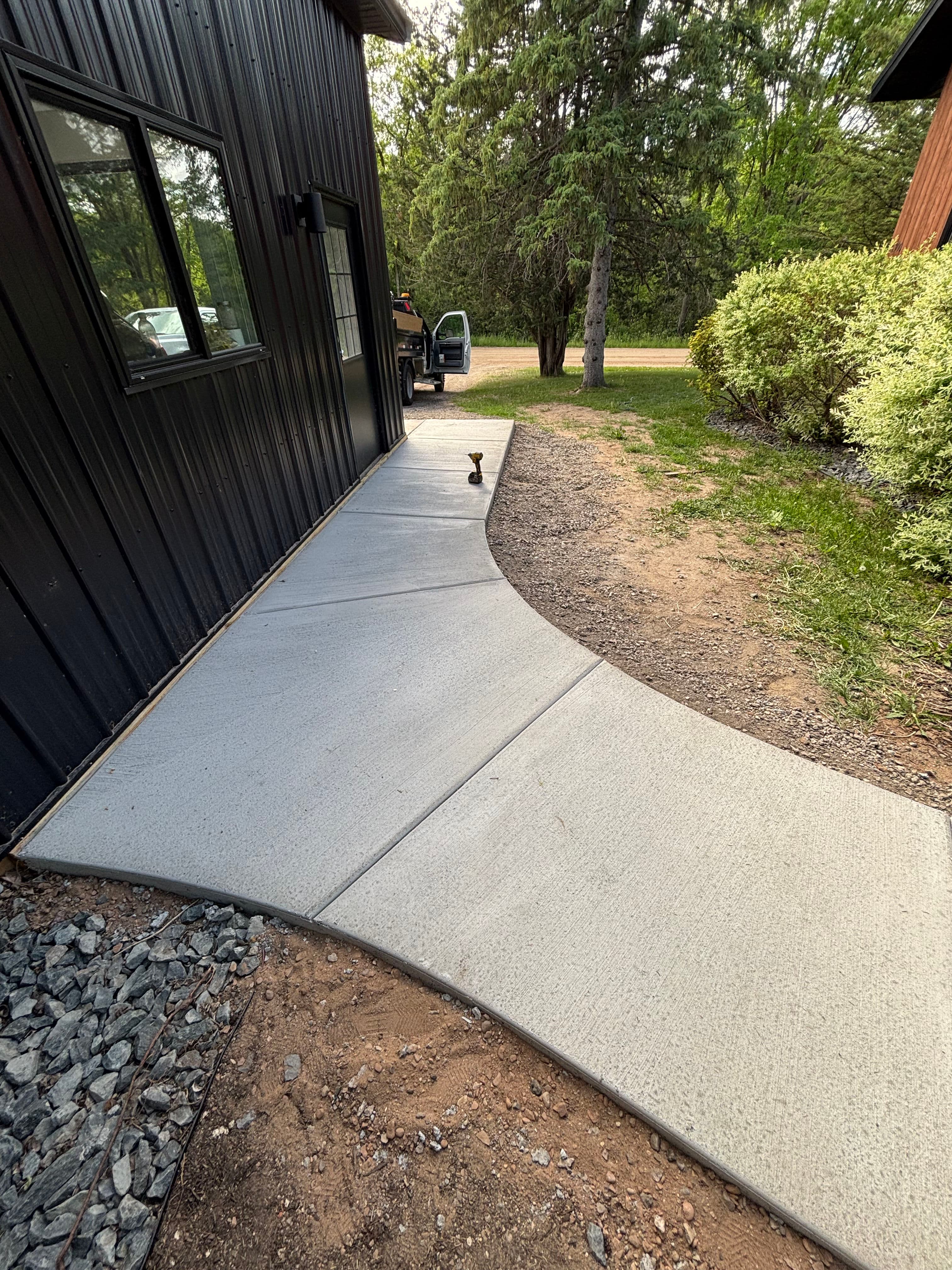 Project New Concrete Sidewalk Installation Wraps a Full Property image