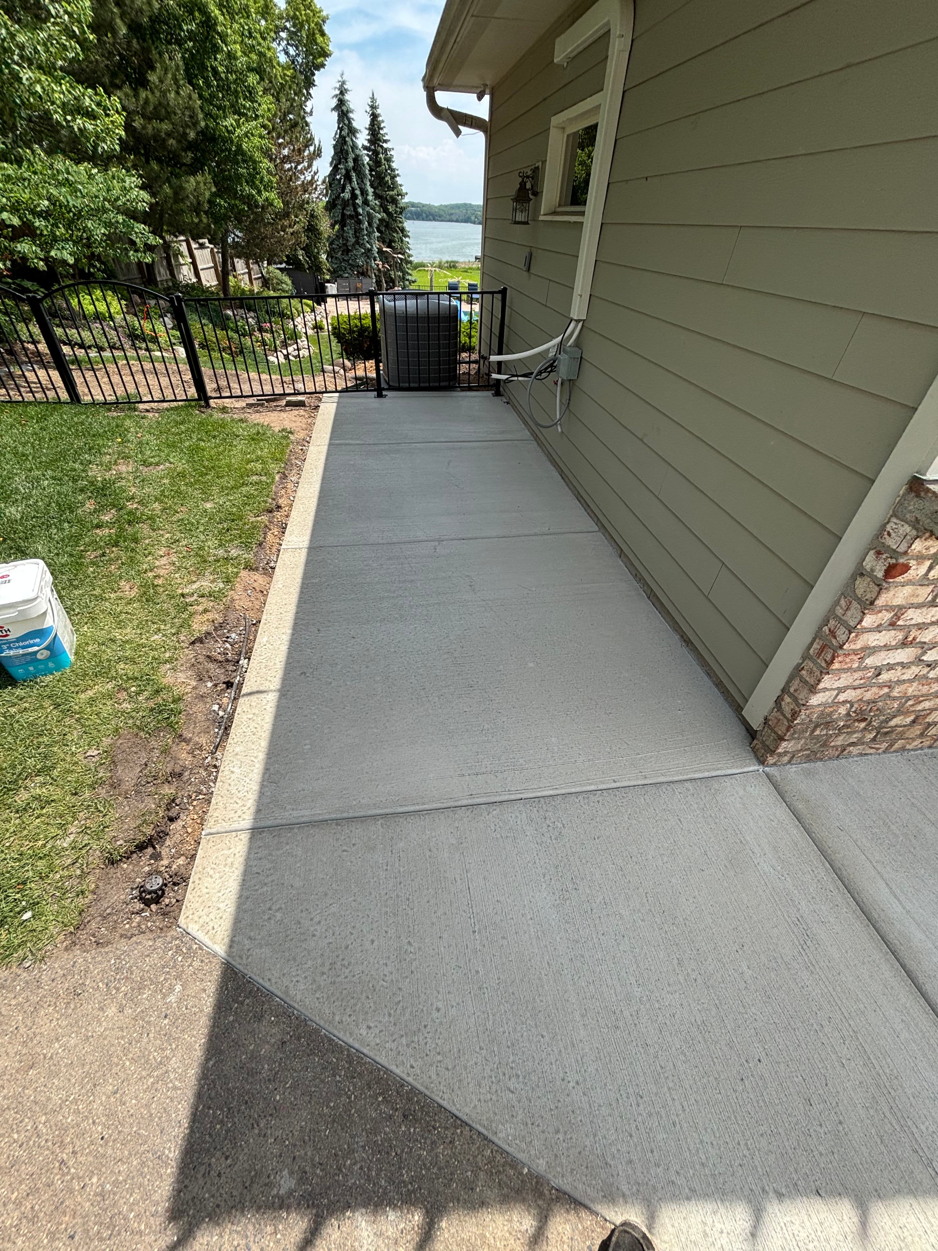Project Clean Concrete Flatwork Across Driveways Walkways and Pads image