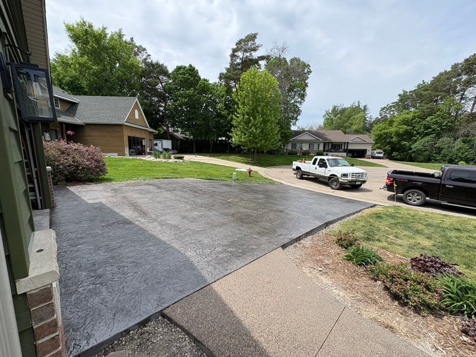 Gallery photos for Slate Gray Roman Slate Stamped Concrete Driveway with Black Accent: Image #2