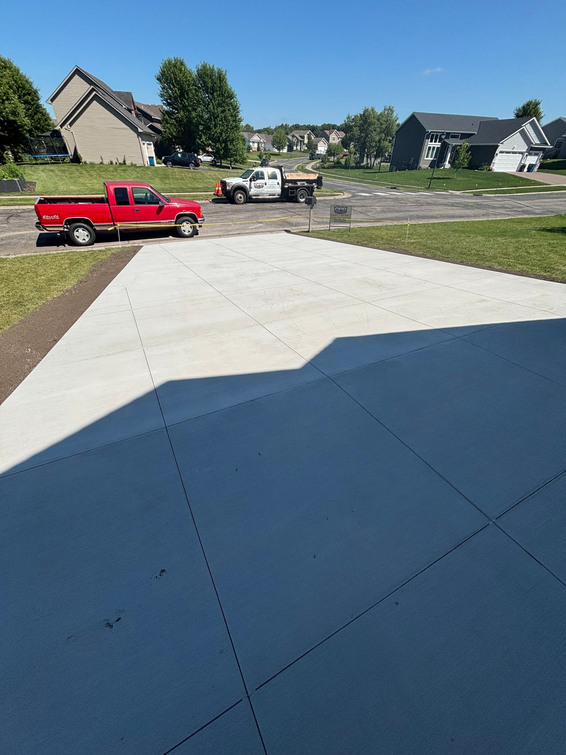Gallery photos for Cracked Asphalt Out, Fresh Concrete Driveway In: Image #2