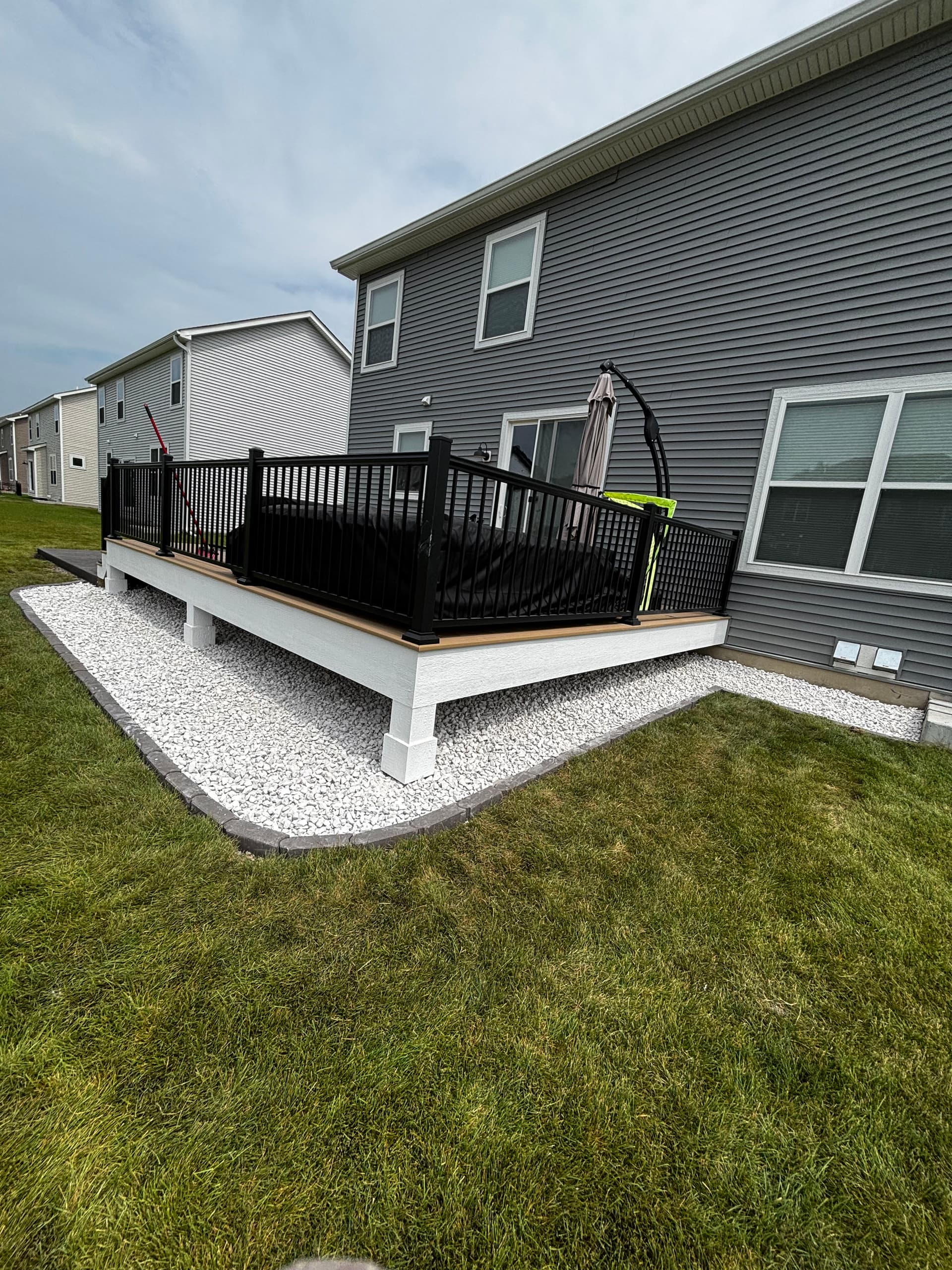 Gallery photos for Stamped Patio, Rock Beds, and Fresh Landscaping That Actually Holds Up: Image #1