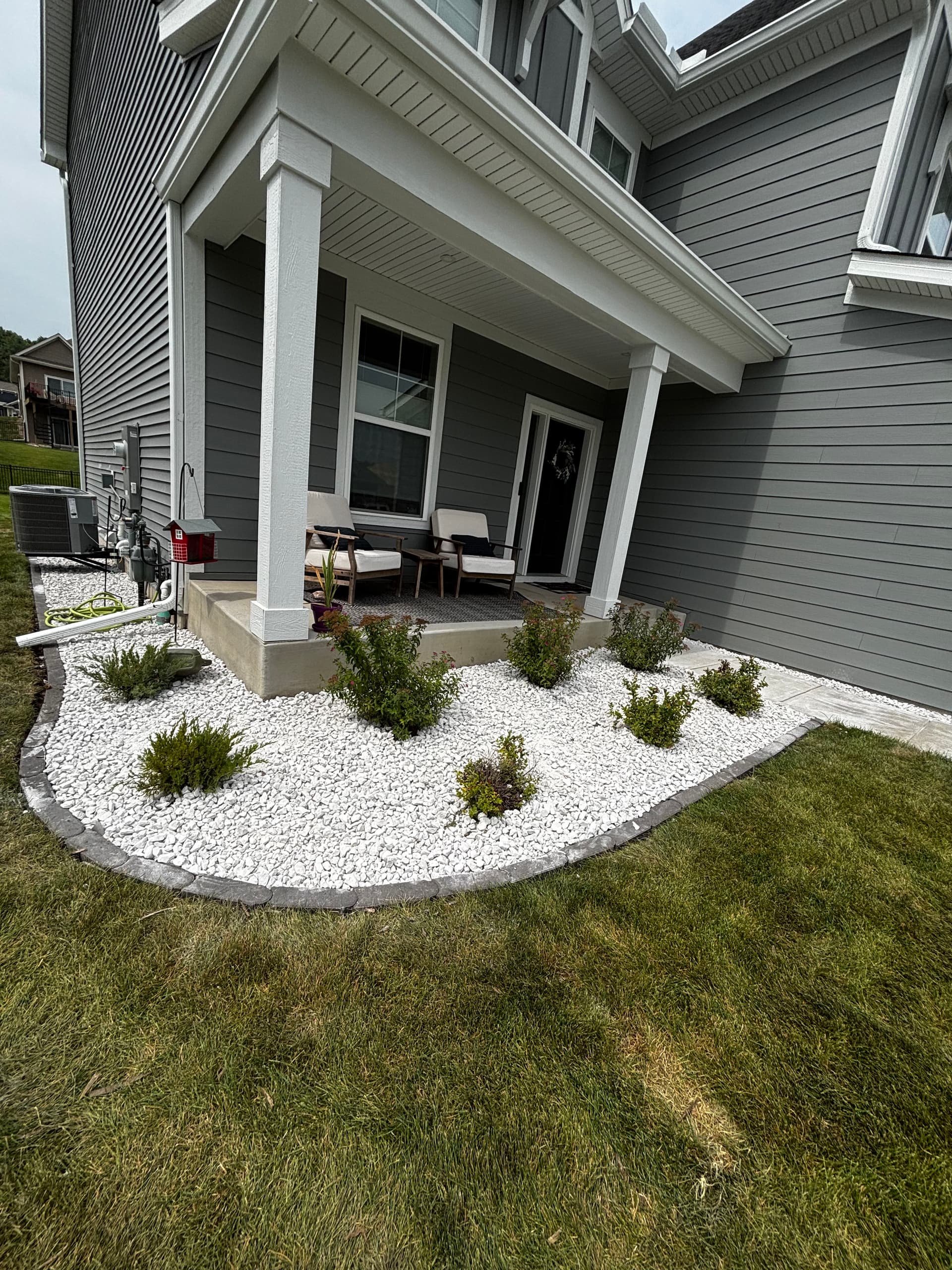 Gallery photos for Stamped Patio, Rock Beds, and Fresh Landscaping That Actually Holds Up: Image #2