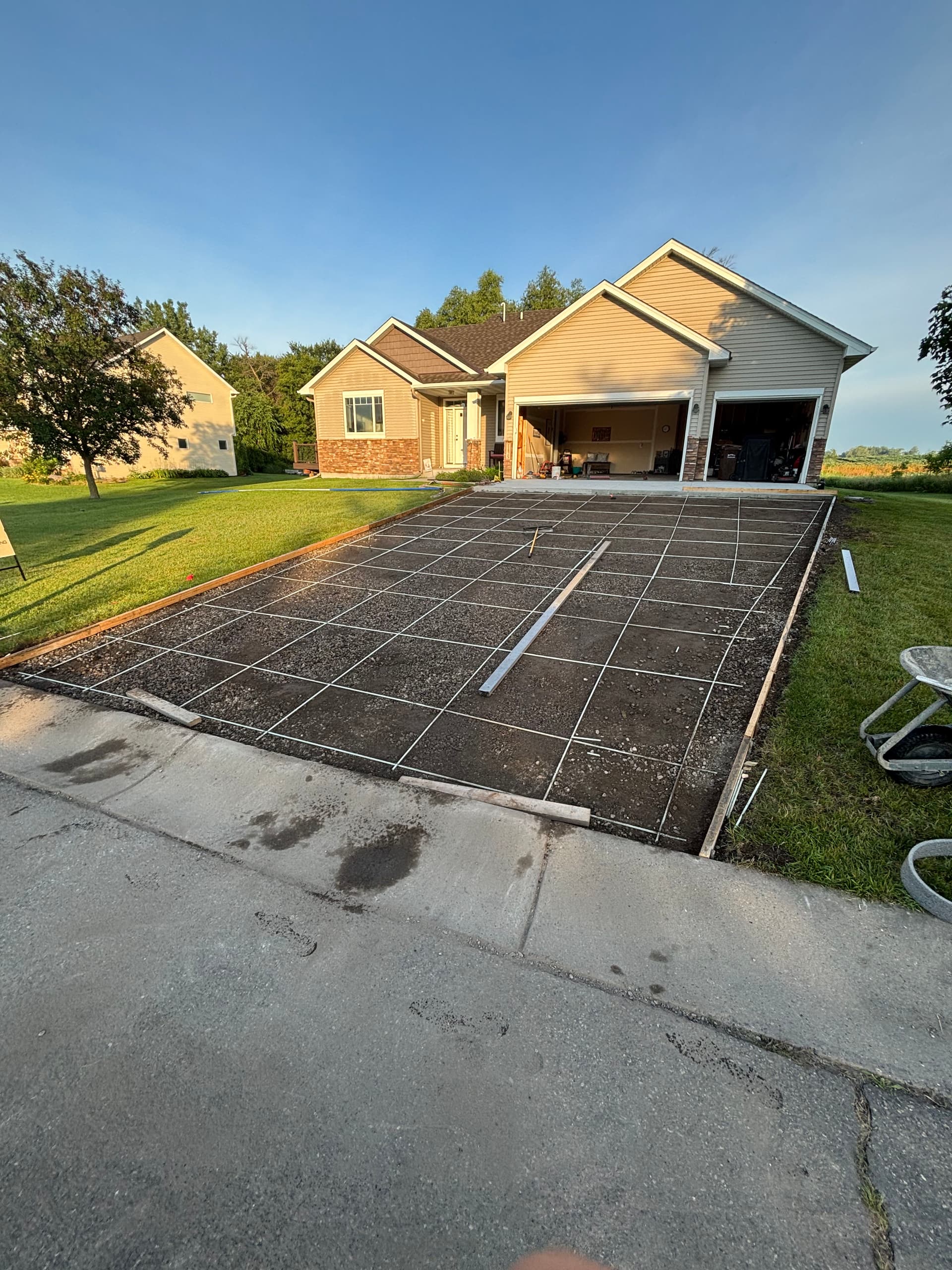 Gallery photos for Cracked Asphalt Out, Fresh Concrete Driveway In: Image #3
