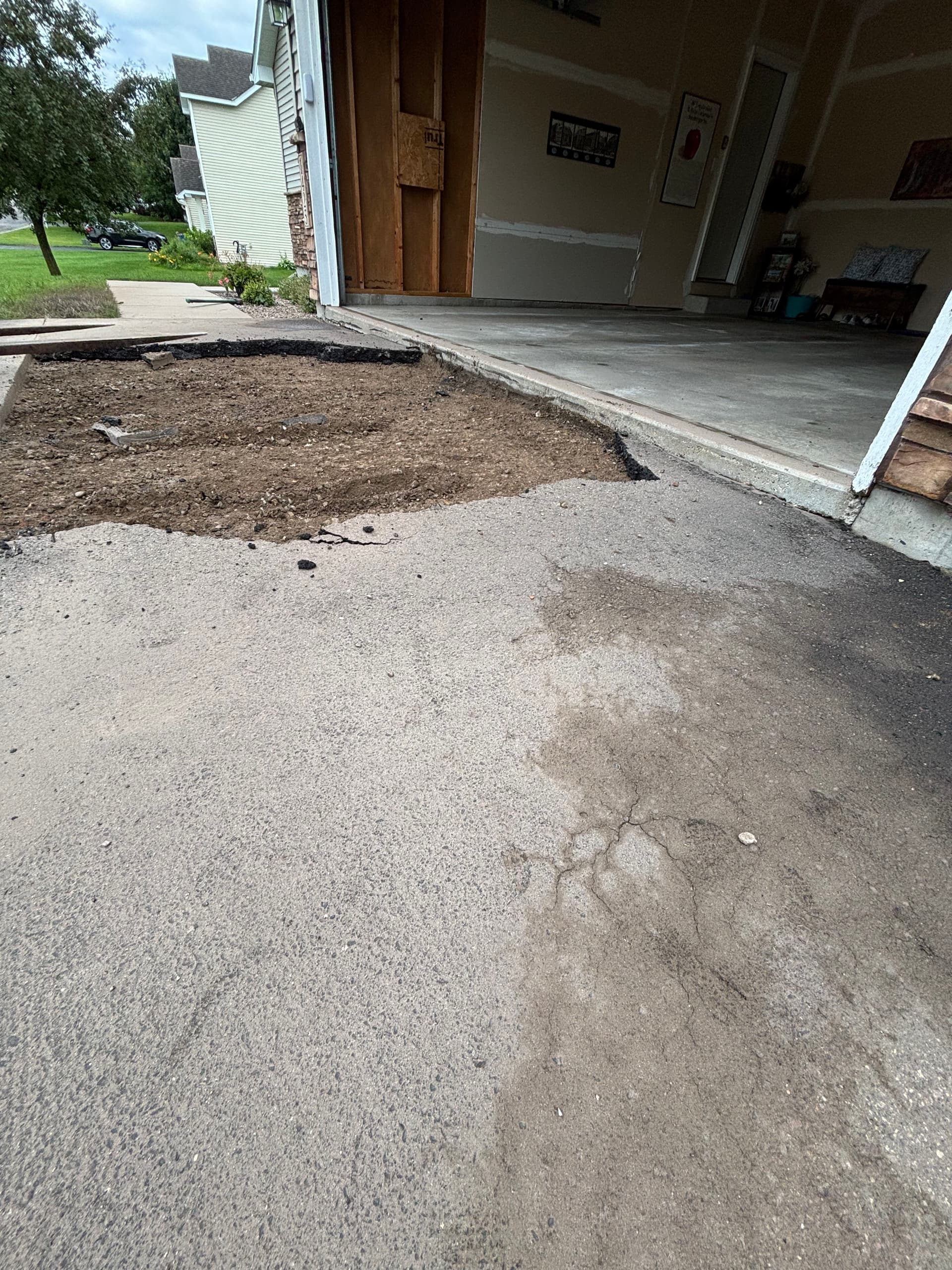 Gallery photos for Cracked Asphalt Out, Fresh Concrete Driveway In: Image #4